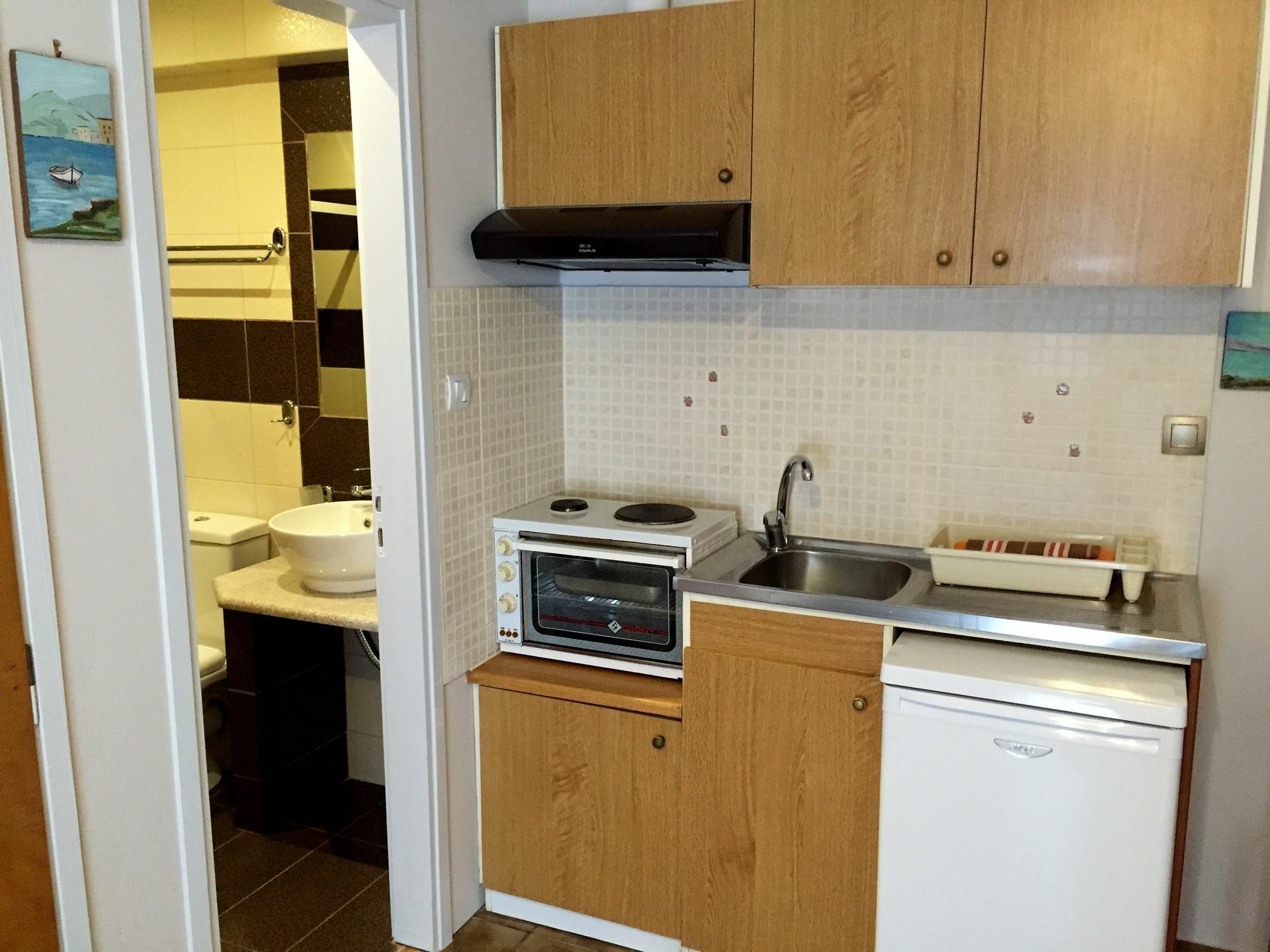 Oasis Apartments Толон Екстериор снимка